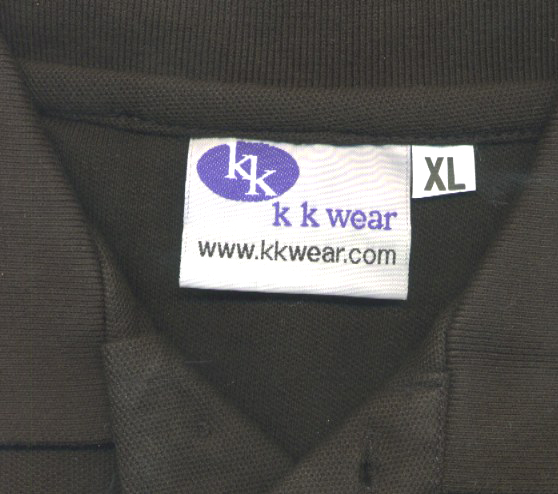 neck label unpicked with replacement inserted in place